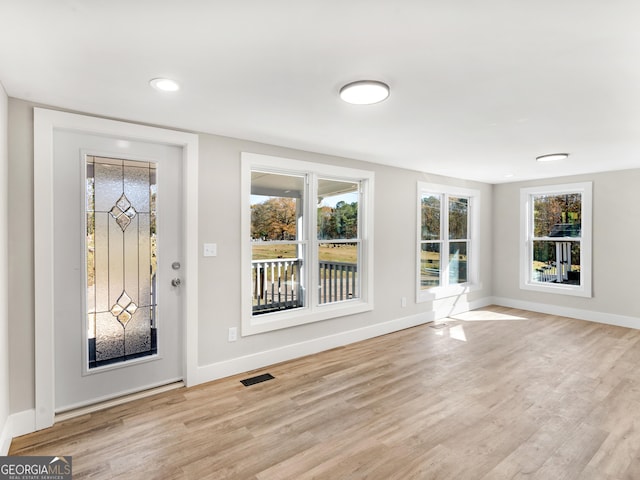 foyer featuring light hardwood / wood-style floors