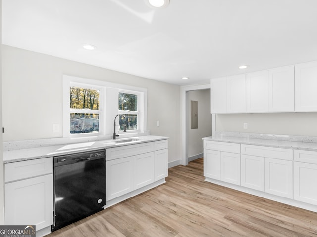 kitchen featuring light hardwood / wood-style floors, dishwasher, sink, and white cabinets