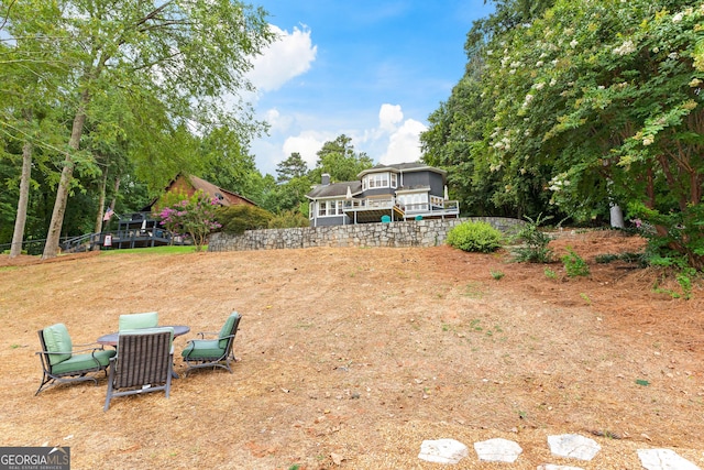 view of yard with a deck