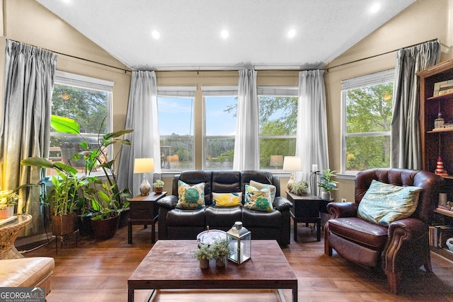 sunroom with vaulted ceiling and plenty of natural light