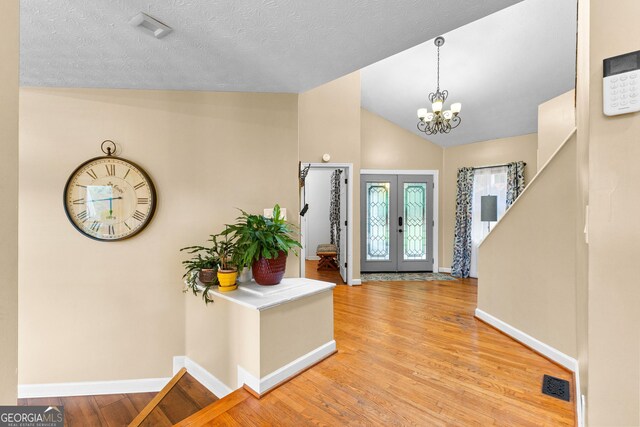 bedroom featuring a water view, ornamental molding, and multiple windows