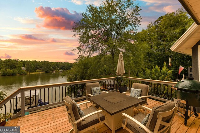 deck at dusk with a water view