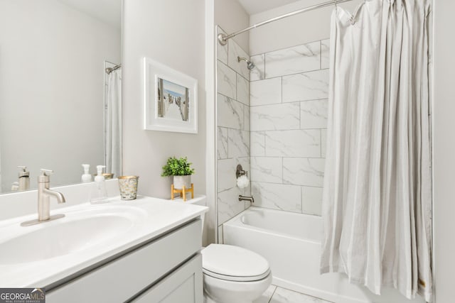 full bathroom featuring vanity, toilet, and shower / bath combo with shower curtain