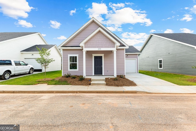 205 Lenox Cir, Lagrange, GA 30241 - view of front of home featuring an attached garage and driveway