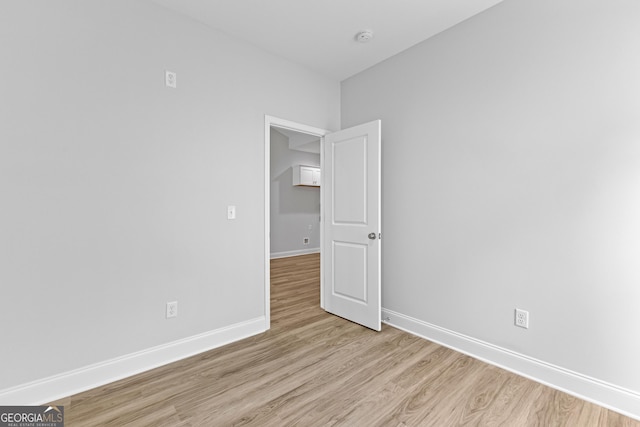 205 Lenox Cir, Lagrange, GA 30241 - spare room featuring baseboards and light wood-type flooring