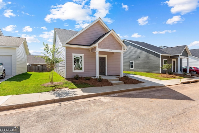 205 Lenox Cir, Lagrange, GA 30241 - view of front facade featuring concrete driveway, covered porch, and a garage