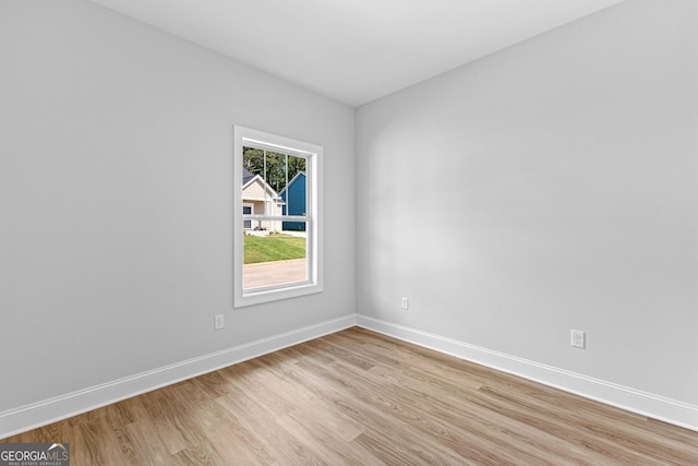 205 Lenox Cir, Lagrange, GA 30241 - unfurnished room with baseboards and light wood-style floors