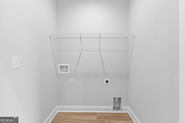 205 Lenox Cir, Lagrange, GA 30241 - laundry room with washer hookup, hookup for an electric dryer, laundry area, wood finished floors, and baseboards
