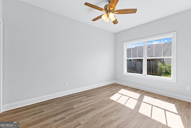 205 Lenox Cir, Lagrange, GA 30241 - empty room with baseboards, ceiling fan, and wood finished floors