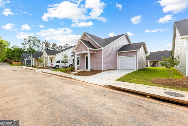 205 Lenox Cir, Lagrange, GA 30241 - kitchen with baseboards, a sink, dark wood-type flooring, and stainless steel appliances