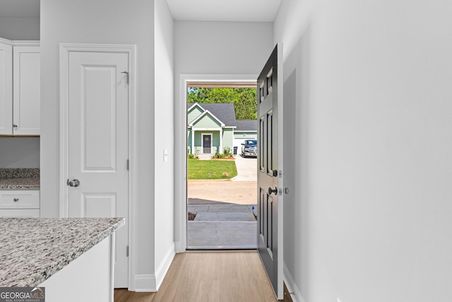 205 Lenox Cir, Lagrange, GA 30241 - kitchen featuring black electric range oven, a sink, baseboards, stainless steel microwave, and dark wood-type flooring
