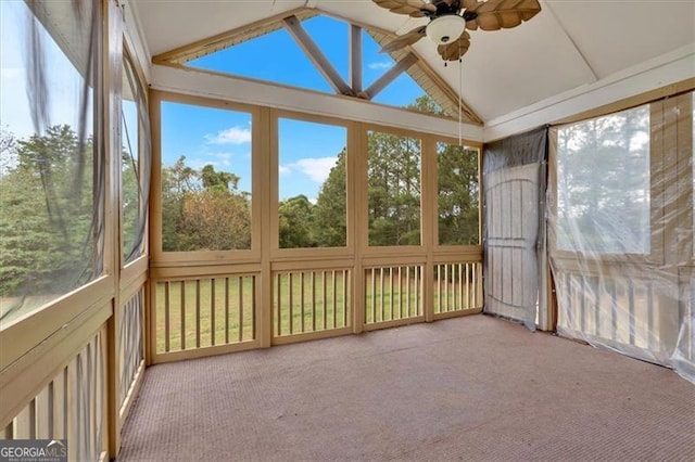 unfurnished sunroom with lofted ceiling and ceiling fan