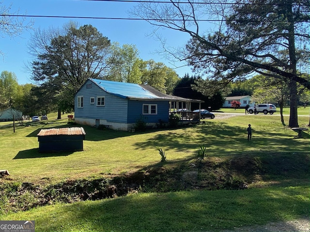 exterior space with a lawn