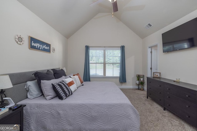 carpeted bedroom with high vaulted ceiling and ceiling fan