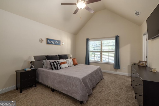 bedroom featuring ceiling fan, high vaulted ceiling, and light carpet