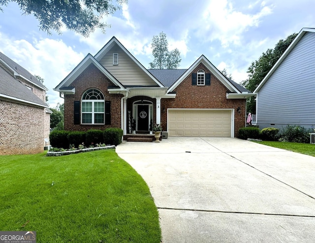 view of front of property with a garage and a front lawn