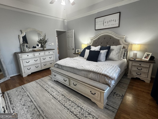 bedroom with ceiling fan, ornamental molding, and dark hardwood / wood-style flooring