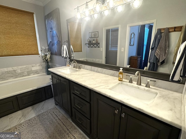 bathroom with vanity and a bath