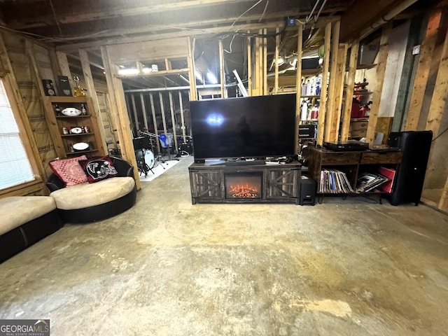 living room featuring concrete floors