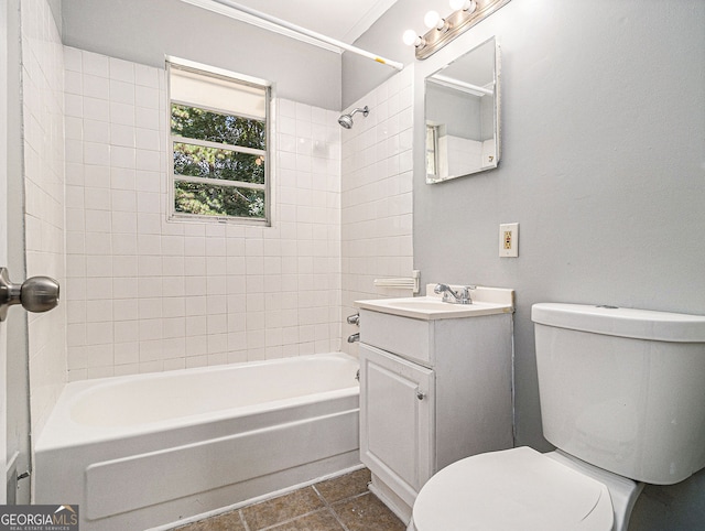 bathroom featuring tub / shower combination, vanity, toilet, and tile patterned floors
