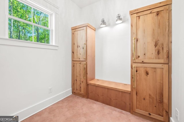4226 Quail Creek Dr, Flowery Branch, GA 30542 - mudroom featuring baseboards