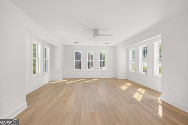 4226 Quail Creek Dr, Flowery Branch, GA 30542 - spare room featuring ceiling fan, healthy amount of natural light, and light wood finished floors