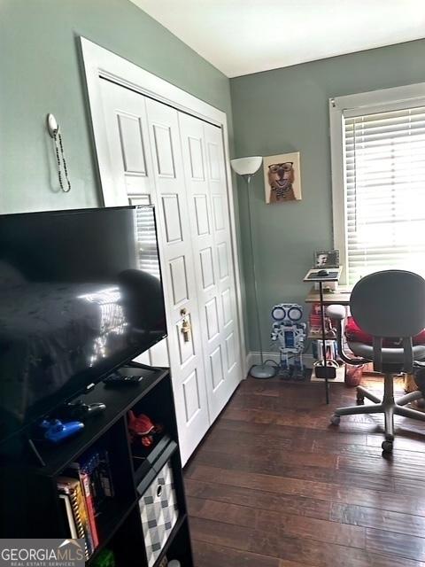 office area featuring dark wood-type flooring