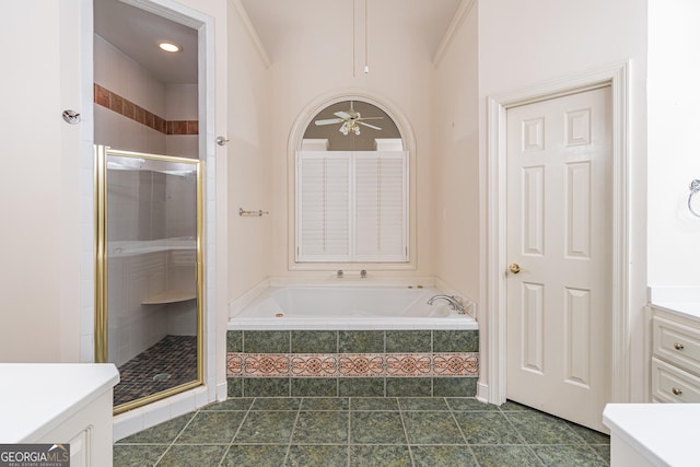 bathroom featuring crown molding, shower with separate bathtub, vanity, ceiling fan, and tile patterned flooring