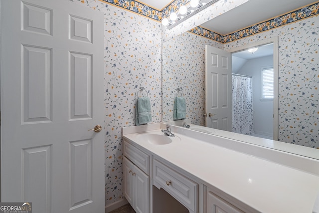 bathroom with vanity and a shower with shower curtain