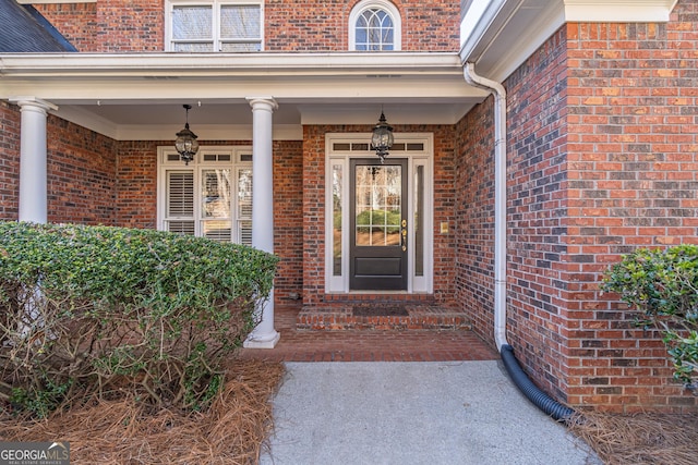 doorway to property with covered porch