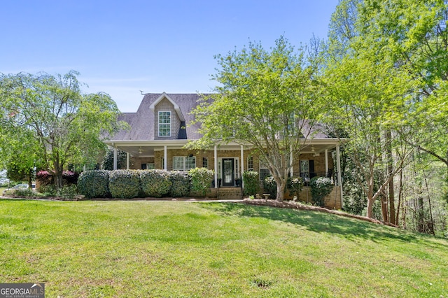 view of front of home with a front yard