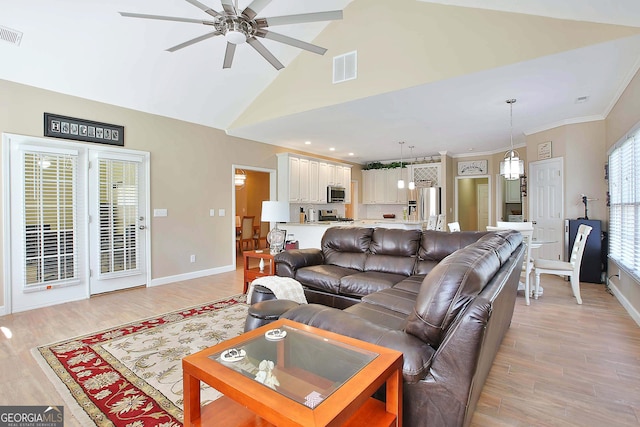 living room featuring high vaulted ceiling, ornamental molding, light hardwood / wood-style floors, and ceiling fan