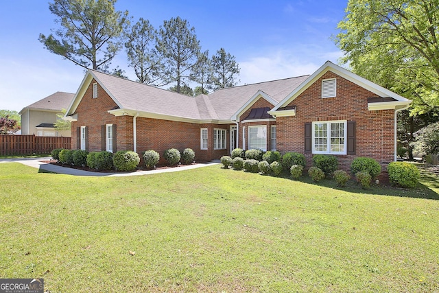 view of front of home featuring a front yard