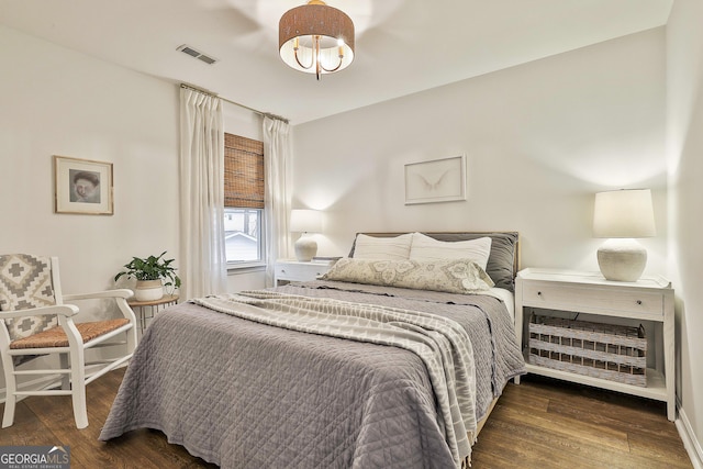 bedroom featuring dark hardwood / wood-style floors