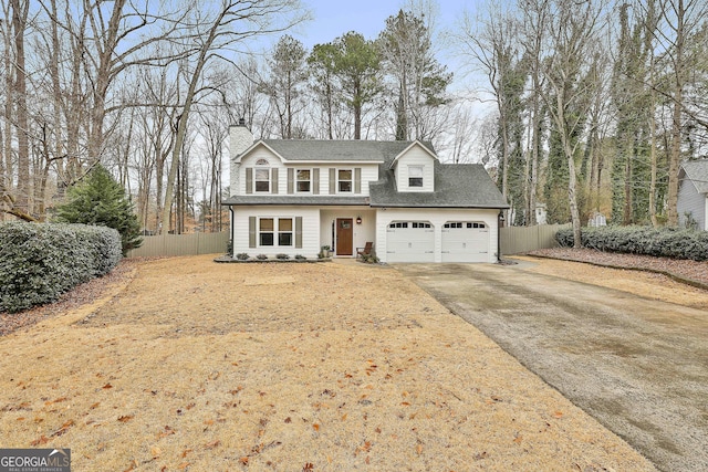 front of property with a garage