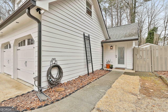 exterior space with a garage