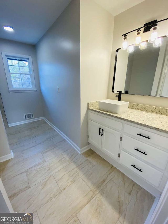 bathroom featuring vanity