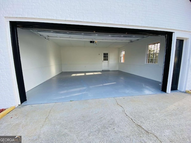 garage featuring a garage door opener