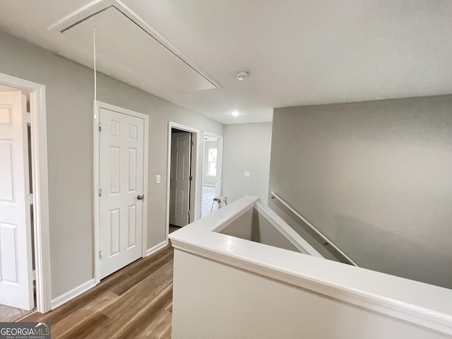 hallway featuring hardwood / wood-style floors