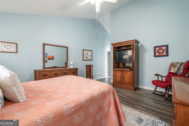 bedroom with ceiling fan, dark hardwood / wood-style floors, and high vaulted ceiling