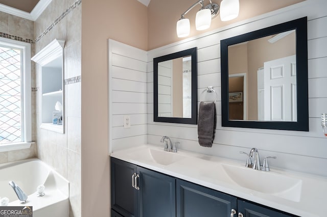 bathroom featuring vanity and a bathtub