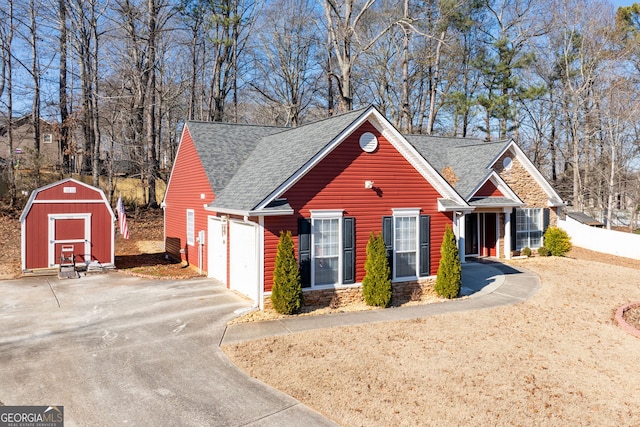 view of front of property featuring a storage unit