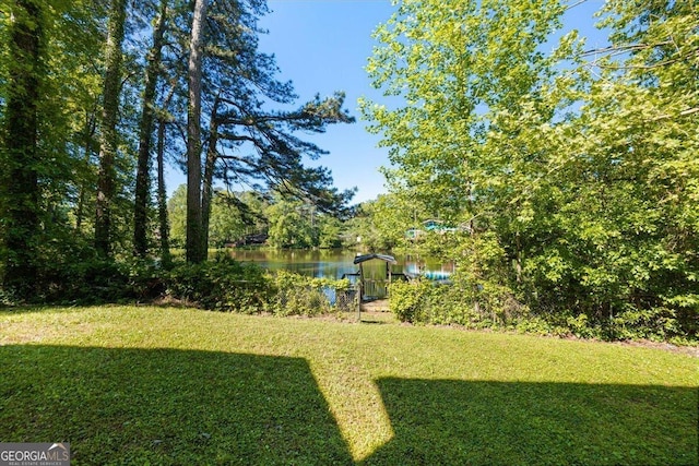 view of yard with a water view