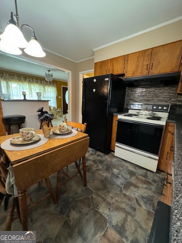 kitchen with black fridge, decorative light fixtures, electric range oven, ornamental molding, and range hood