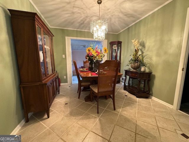 tiled dining area with crown molding and a chandelier