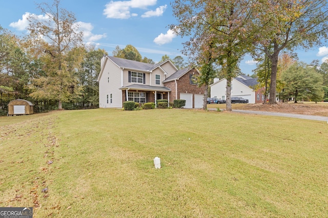 view of front property featuring a storage shed, a garage, covered porch, and a front lawn