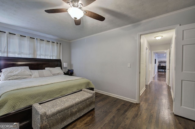 bedroom with crown molding, hardwood / wood-style floors, and a textured ceiling