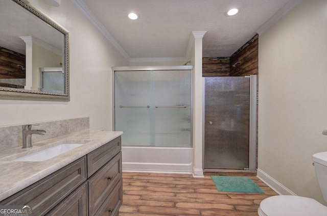 full bathroom featuring crown molding, wood-type flooring, shower / bath combination with glass door, and toilet