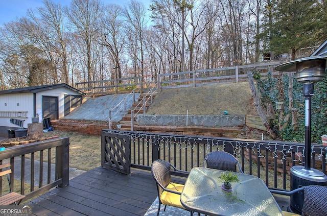 deck featuring a storage shed