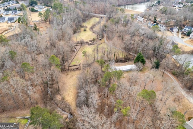 aerial view featuring a water view